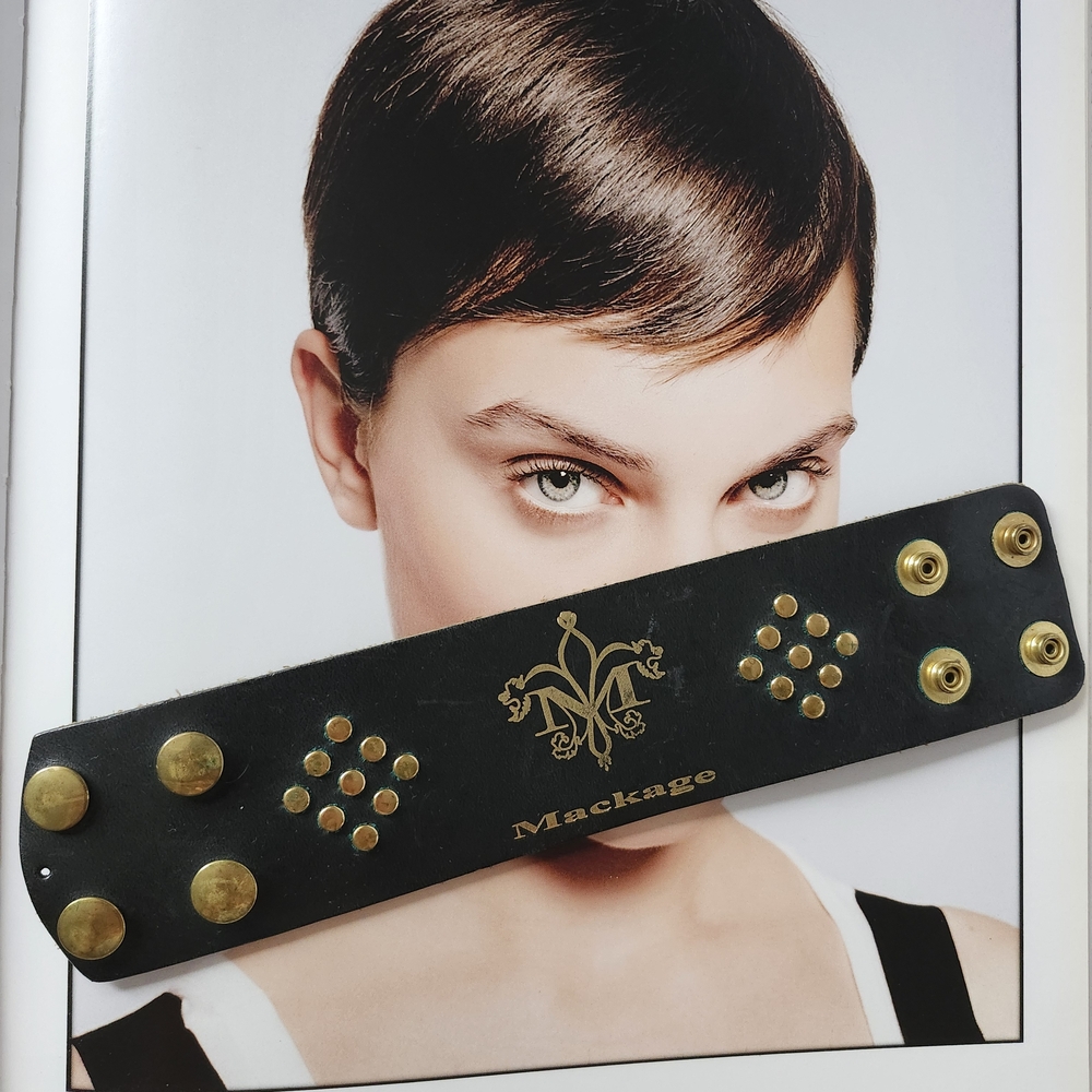 Mackage Black and Gold Bracelet with Elegant Design
